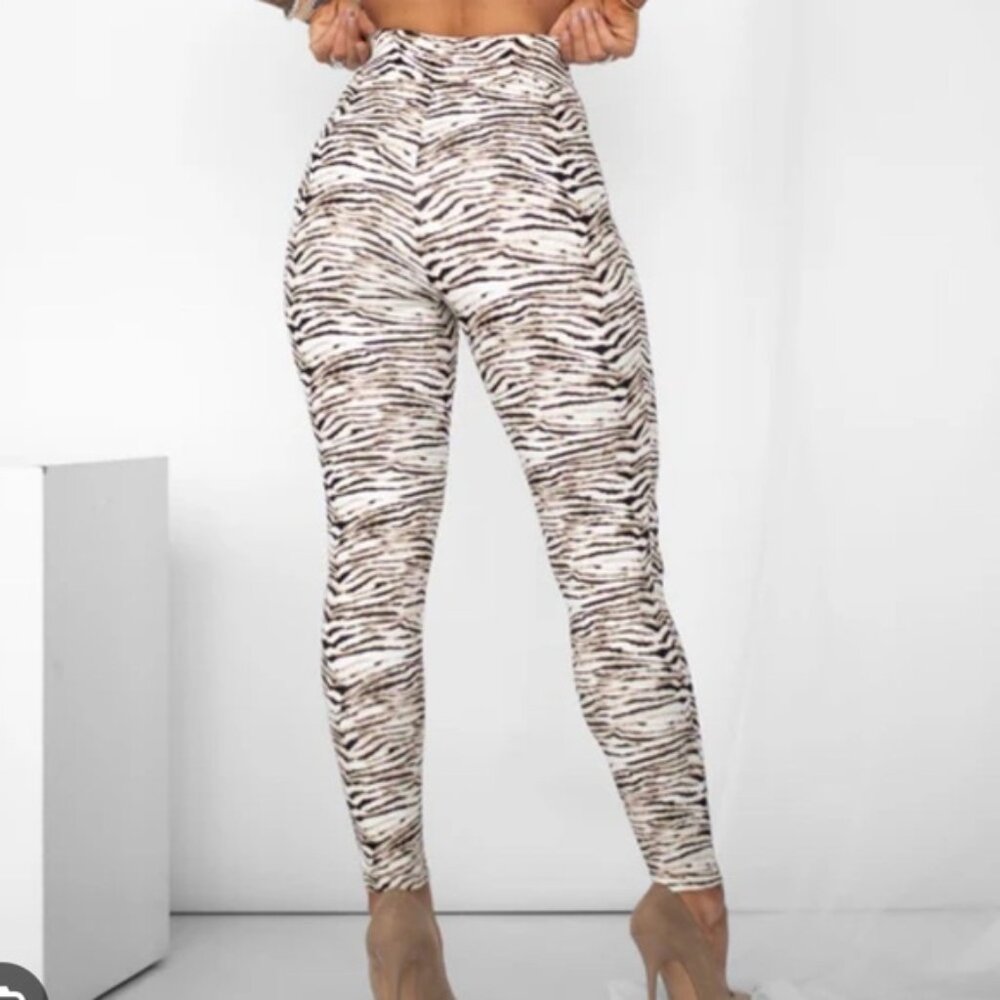 Zebra leggings from Byegreis. Size large.